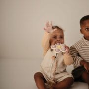 Mushie - Baby bloem drukspeeltje lila